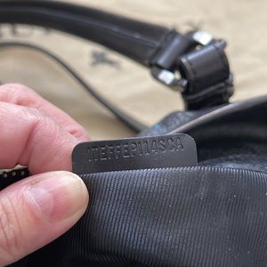 Burberry black leather shoulder bag.